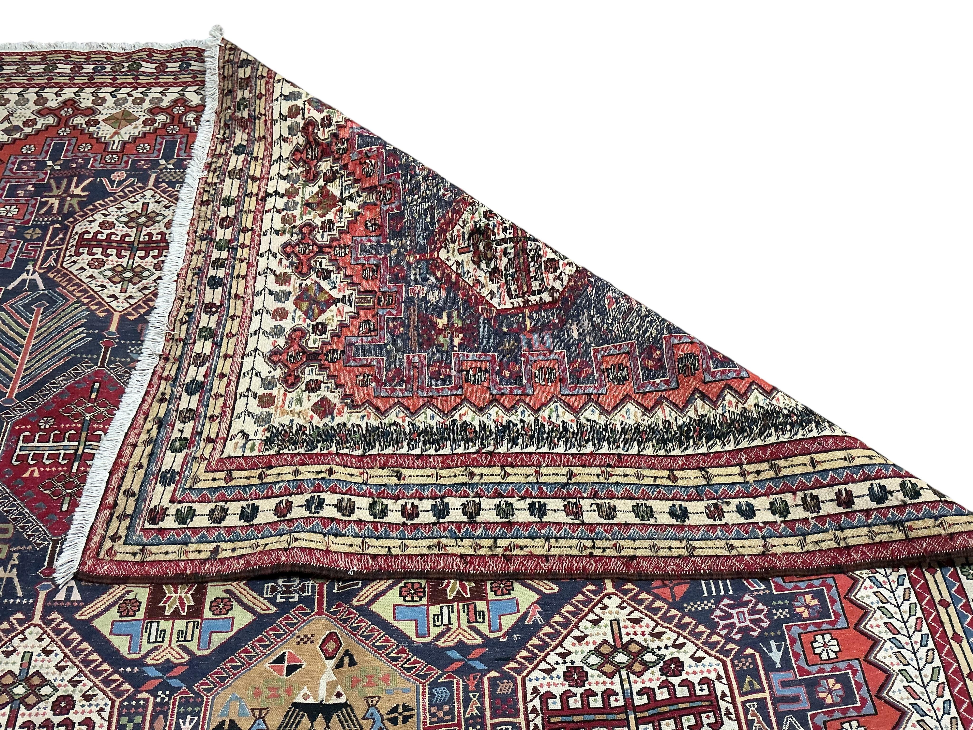 A Soumak blue ground carpet, 300 x 200cm